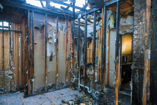 Professional Fire Damage Restoration technician working in Whitehorn Cove, OK